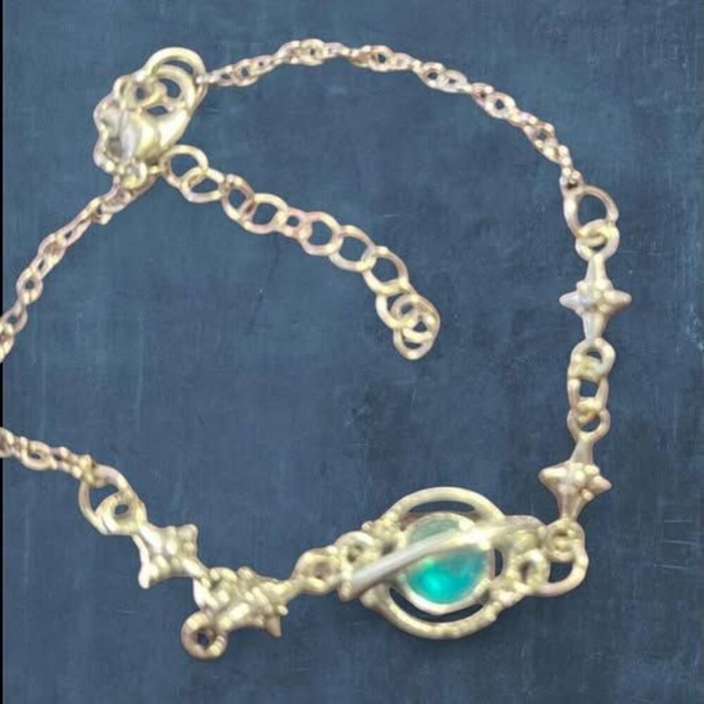 grunge silver y2k style silver chain adjustable bracelet with blue galaxy center